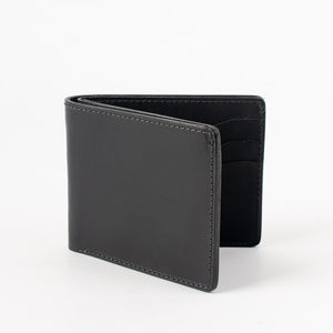 Obbi Good Label Kingsman Classic Bi Fold Wallet - Black - Outside front slightly open displayed on white background